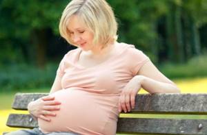 Колики в животе при беременности на ранних и поздних сроках