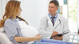 Почему болит живот при беременности и как снять боль