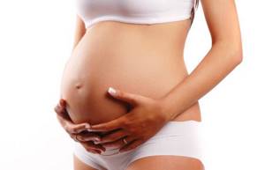 Вздутие живота на ранних сроках беременности: почему происходит и что делать